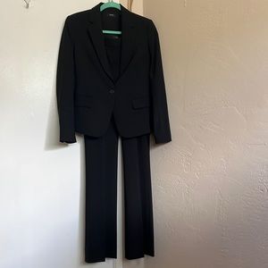 Theory black woman’s suit with pants